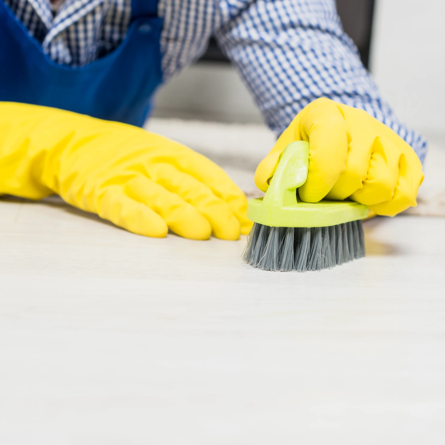 man cleaning his home