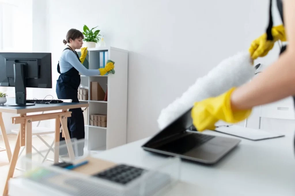 People taking care of office cleaning
