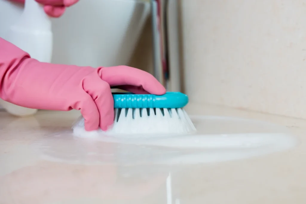 Concept of man cleaning his bathroom in Denver